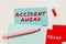 Sign displaying Accident Ahead. Internet Concept Freight Carrier Airmail Transport goods through airplane