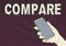 Sign displaying Compare. Internet Concept Estimate Measure Note the similarities dissimilarities between Hand Holding