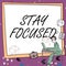 Sign displaying Stay Focused. Word Written on Be attentive Concentrate Prioritize the task Avoid distractions Man