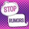 Sign displaying Stop Rumors. Word Written on put an end circulating the story of uncertain or doubtful truth