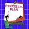 Sign displaying Strategic Plan. Business idea A process of defining strategy and making decisions