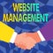 Sign displaying Website Management. Business approach control of the hardware and software used in a website Abstract