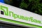 A sign on the facade of a large Ukrainian Privat Bank with the inscription Privatbank. Financial department in Dnepropetrovsk