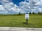 A sign in front of an apartment building that says future resident parking in Orlando, Florida