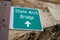 Sign guiding visitors directions to the iconic Stone Arch Bridge in downtown Minneapolis