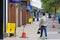 A sign in the high street asking people to follow a one way system and follow social distancing rules during the coronavirus