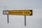 Sign in the Icelandic highlands telling there are 104 kilometers to the nearest town Egilsstadir