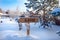 A sign indicating the direction of the sauna. Russia, winter. The inscription on the plate in Russian-sauna