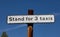 Sign indicating a taxi stand for three taxis in Widnes town centre April 2019