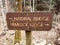 A sign for the natural bridge and Hemlock Lodge in Natural Bridge State Park - KENTUCKY