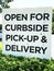 Sign `Open for curbside pick-up and delivery`