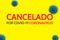 Sign with the phrase in spanish of canceled by covid 19 or coronavirus
