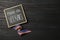 Sign with phrase Thank You, Veterans and ribbon on black wooden table, top view. Space for text