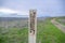 Sign post with Warning Buried Waterline on a hiking trail at San Clemente, California