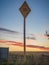 Sign: Power Cable, with evening clouds in the background