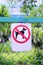 Sign prohibiting dog walking, no dogs sing vertical location