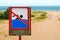 Sign prohibiting swimming in sea. Sign no swim.