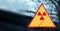 Sign of radiation hazard against radioactive waste, picture with a blured place for your text, copy space, your text here
