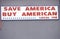 A sign that reads ï¿½Save America Buy Americanï¿½