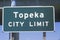 A sign that reads ï¿½Topeka city limitï¿½