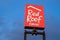 Sign for the Red Roof Inn, a budget-friendly cheap motel brand