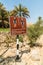 Sign requiring full coverage swimwear at the Wadi Bani Khalid, Oman