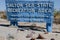 Sign for the Salton Sea State Recreation area welcomes campers and fishermen to the shores of the