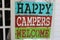 Sign saying happy campers welcome