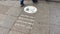 Sign saying `Please wear a mask` painted on pavement/sidewalk of Shopping Street to stop spreading Corona Virus