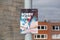 A sign by the seaside showing a child injured by jumping into the water or tombstoning with the words sorry mum written on it