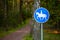 A sign showing a bridle path, bridleway, equestrian trail or horse riding path in a park