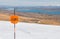 Sign Ski area boundary and view to a lake