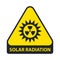 Sign of solar radiation. yellow triangle.