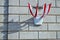 Sign of state with four flags with shadows on background of wall of bricks in Vienna Austria