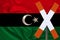 Sign, stop, attention against the background of the silk national flag of Libya, the concept of border and customs control,