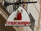 Sign in street in Seville in Spain advertising a Spanish beer called `Cruzcampo`