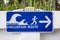 Sign, tsunami, escape route, evacuation route, evacuation, route, escape, rescue, safety, grass, white, blue, green, direction,