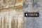 Sign on the wall of the cathedral in Viviers that indicates the