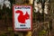 Sign warning caution due to endangered red squirrels in the area, Scotland