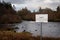 Sign warning of danger due to sudden increase in water due to hydro scheme