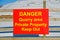 A sign warning of danger in a quarry.