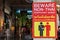 A sign warns of a gang of street thieves and pickpocket, Thailand