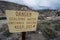 Sign warns of scalding water in the Hot Creek Geological Area near Mammoth Lakes California, in the Eastern Sierra Nevada