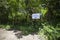 A sign welcoming people to Blue Lagoon beach near Padang Bai or Padangbai in Bali, Indonesia.