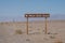 Sign for West Side Road, a remote backcountry desert, dirt road in Death Valley National Park in California