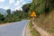 Sign winding road on a mountain road