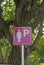 Sign for woman parking in car park. Lady parking sign