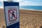 Sign written in French indicating an unpatrolled beach, Anglet, France