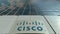 Signage board with Cisco Systems logo. Modern office building facade. Editorial 3D rendering