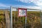 Signage of a construction site at a fence: Enter the construction site prohibited! Parents are responsible for their children